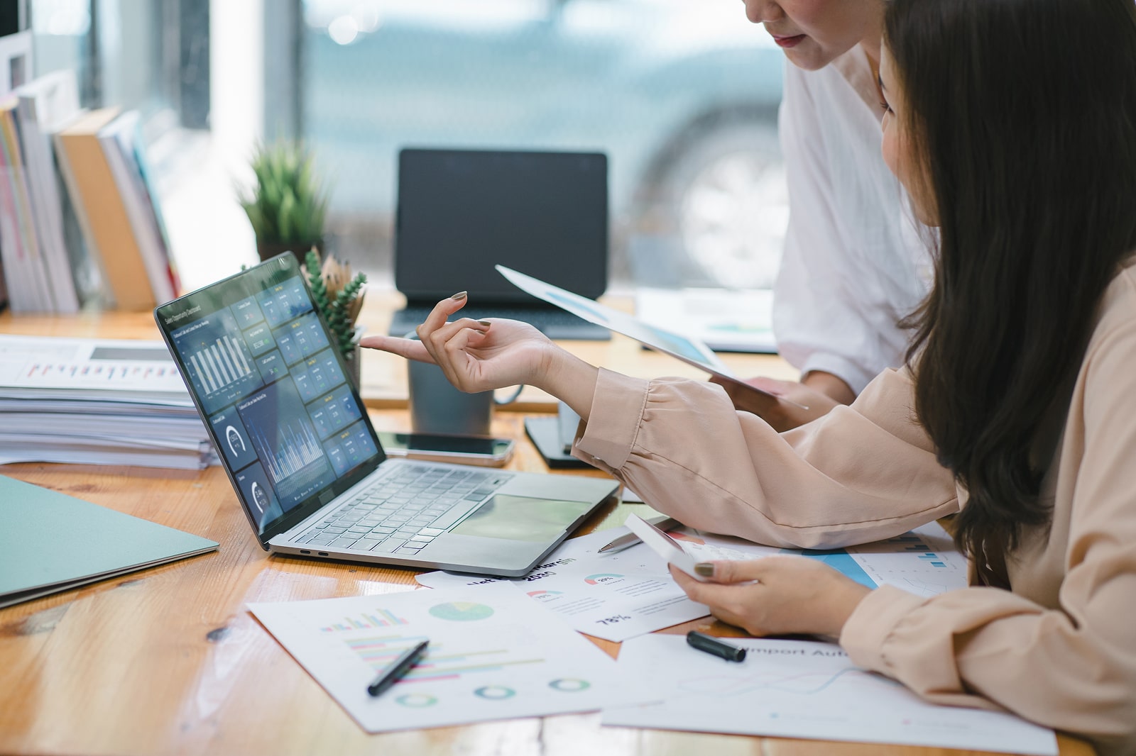 Office working sitting by laptop. 